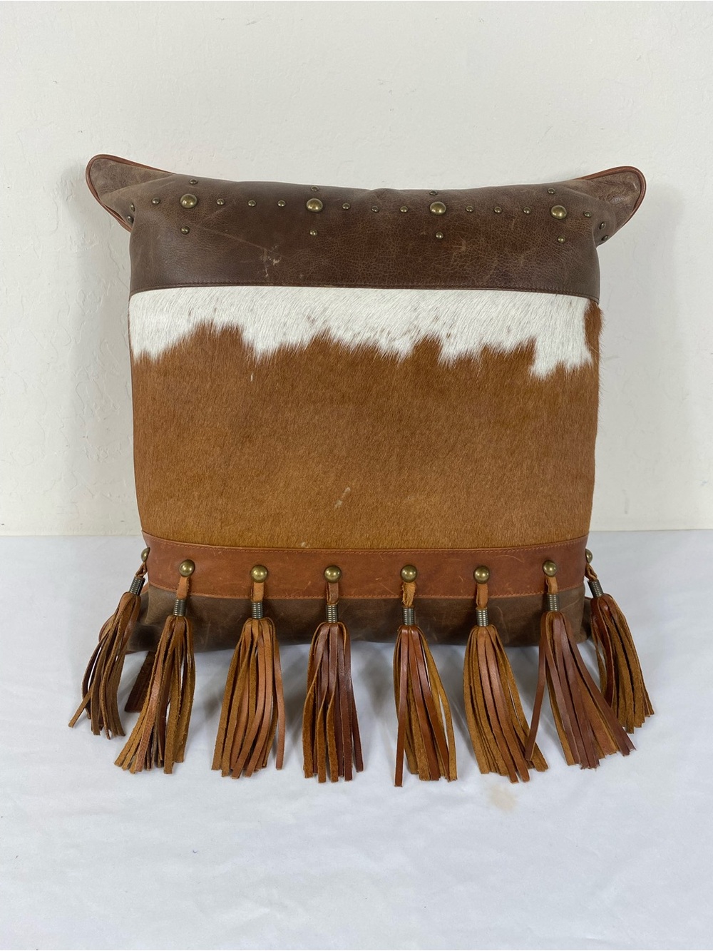 Cowhide & Leather Tassel Accent Pillow in Brown and White